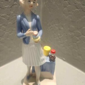 Porcelain Tupperware Lady Figurine 8"